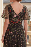 Vestido largo de madre de la novia bordado con tul negro en pico