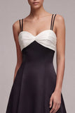 Vestido formal de tirantes largos en blanco y negro