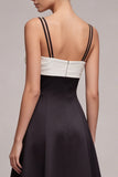 Vestido formal de tirantes largos en blanco y negro