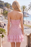 Vestido corto de bienvenida rosa sin tirantes con volantes ajustados perlas y lazo