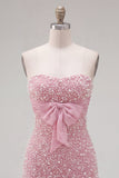 Vestido corto de bienvenida rosa sin tirantes con volantes ajustados perlas y lazo