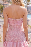 Vestido corto de bienvenida rosa sin tirantes con volantes ajustados perlas y lazo