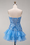 Vestido corto de bienvenida a casa con lentejuelas sin tirantes azules y con volantes