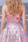 Vestido de bienvenida rosa brillante de tirantes sin tirantes con lazos