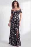 Vestido largo de sirena negra floral con volantes y abertura de sirena descubierto