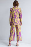 Trajes de mujer de dos piezas con solapa de dos piezas y un botón amarillo y morado