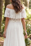 Vestido de novia largo de tul largo en línea marfil con hombros descubiertos