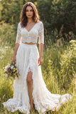 Vestido de novia largo de encaje marfil con escote en V y manga media con abertura