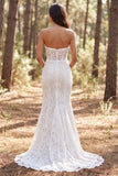 Vestido largo de novia largo de encaje sirena marfil de marfil con volantes y abertura