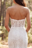 Vestido largo de novia largo de encaje sirena marfil de marfil con volantes y abertura