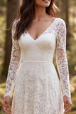 Vestido de novia de manga larga línea A de encaje marfil con abertura