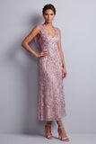 Vestido vintage malva con escote halter, lentejuelas y floral largo de madre de novia