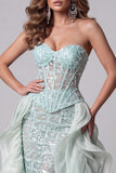 Vestido largo de concurso con corsé de sirena verde menta transparente, lentejuelas, con cola de volantes
