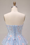 Corsé sin tirantes azul Línea A floral con volantes y cintura vasca vestido de bienvenida