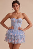 Corsé sin tirantes azul Línea A floral con volantes y cintura vasca vestido de bienvenida