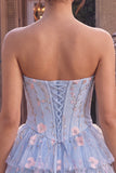 Corsé sin tirantes azul Línea A floral con volantes y cintura vasca vestido de bienvenida