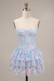 Corsé sin tirantes azul Línea A floral con volantes y cintura vasca vestido de bienvenida