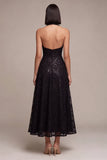 Vestido formal midi sin espalda sin espalda negro con cuello halterdo