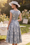 Vestido de madre de la novia, bateau gris con escote en A y estampado floral