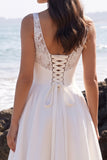 Vestido de novia blanco de escote en V con encaje apliqueado hasta el largo del té