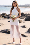 Mini vestido de novia de tul blanco con funda con capçalera
