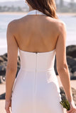 Mini vestido de novia de tul blanco con funda con capçalera