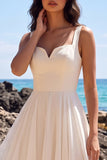 Vestido de novia midi blanco de chiffon plisado y escote en V