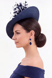 Sombrero Fascinator de Tela Sinomay verde oscuro con plumas