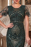Vestido de los años 20 con flecos verde oscuro con cuello redondo y cuentas con flecos