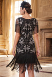Vestido negro dorado de cuello redondo con lentejuelas de los años 20 y flecos