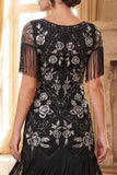 Vestido negro dorado de cuello redondo con lentejuelas de los años 20 y flecos