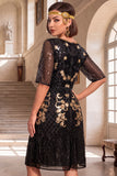 Vestido de flapper de los años 20 con bordado dorado negro de cuello redondo y lentejuelas de manga media