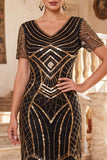 Vestido negro de los años 20 con flecos de manga corta y escote en V y lentejuelas