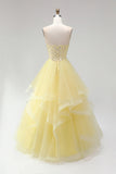 Vestido de baile amarillo Corsé perlas sin tirantes Vestido largo de graduación con volantes y escalones