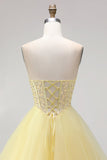 Vestido de baile amarillo Corsé perlas sin tirantes Vestido largo de graduación con volantes y escalones