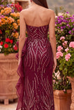 Vestido largo sin tirantes Sirena con lentejuelas burdeos y abertura con volantes
