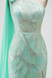 Vestido largo verde de sirena de un hombro con tul adornado con cuentas, flores de tul con cuentas y abertura