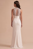 Vestido de novia largo blanco de lentejuelas corte sirena con cuello alto