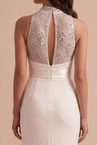 Vestido de novia largo blanco de lentejuelas corte sirena con cuello alto