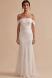 Vestido de novia largo blanco de tul corte sirena con abalorios y escote de hombros descubiertos