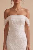 Vestido de novia largo blanco de tul corte sirena con abalorios y escote de hombros descubiertos