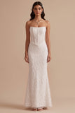 Vestido de novia blanco corte sirena sin tirantes con corsé y bordados