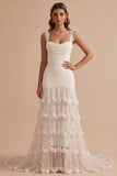 Vestido de novia blanco largo de tul corte sirena con escote drapeado volantes lentejuelas y flores 3D