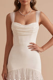 Vestido de novia blanco largo de tul corte sirena con escote drapeado volantes lentejuelas y flores 3D