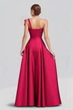 Vestido formal largo de satén con lazo de un hombro fucsia