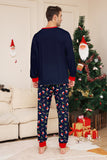 Conjunto de pijamas a juego con estampado de feliz Navidad en azul marino