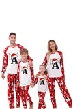 Conjunto de pijama familiar con estampado navideño rojo y blanco a juego