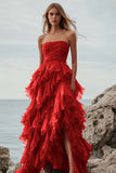 Vestido formal largo fucsia sin tirantes con volantes y abertura
