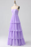 Vestido de dama de honor largo de talla más largo y filetes sin tirantes lila plisados en A-Line