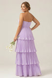 Vestido de dama de honor largo de talla más largo y filetes sin tirantes lila plisados en A-Line